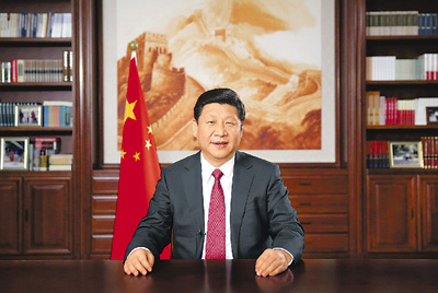 新年前夕,国家主席习近平通过中国国际广播电台、中央人民广播电台、中央电视台发表二〇一四年新年贺词。 新华社记者 兰红光摄